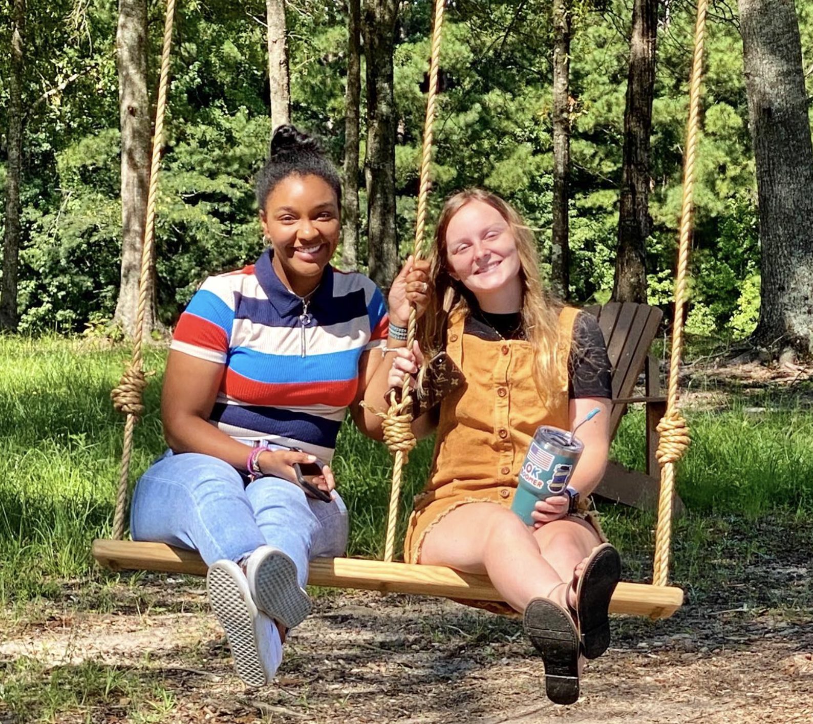 Residents enjoying the swings at swing park near the government center in Smiths Station, Alabama